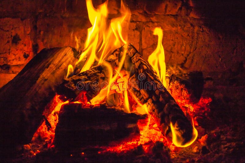 A fire burns in a fireplace, Fire to keep warm