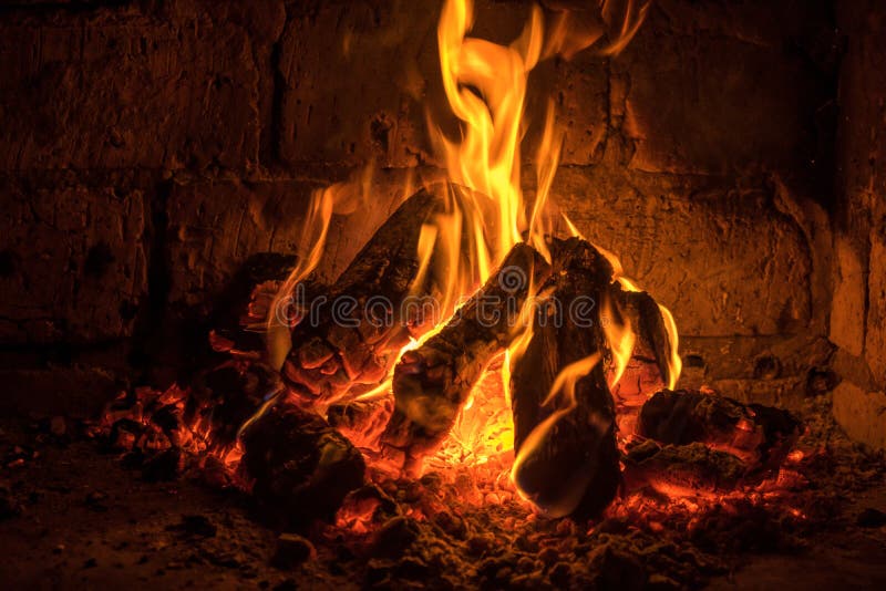 A fire burns in a fireplace, Fire to keep warm