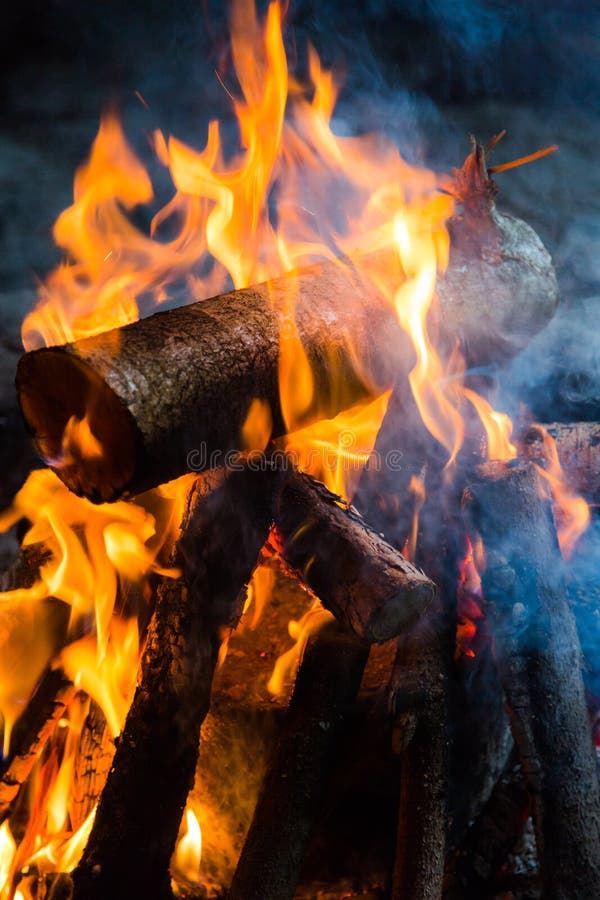 Fire camp close up with orange flames and smoke stock photo Fire camp close up with orange flames and smoke stock photo