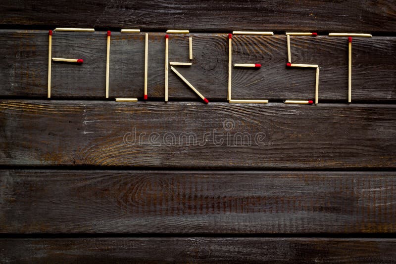 Download Fire Concept With Forest Text On Wooden Background Top View Mock Up Stock Image - Image of ...