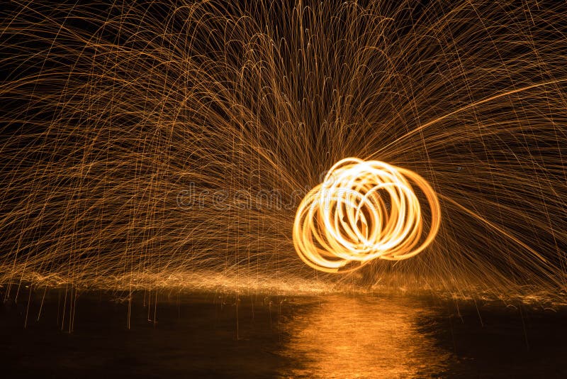 Fire Dancing in Water stock photo. Image of flame, activity 62186048