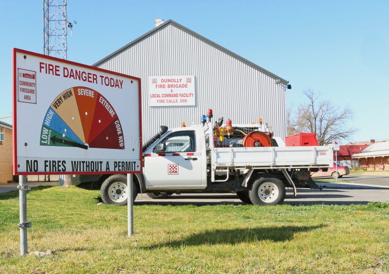 Fire department vehicles and fire danger ratings sign