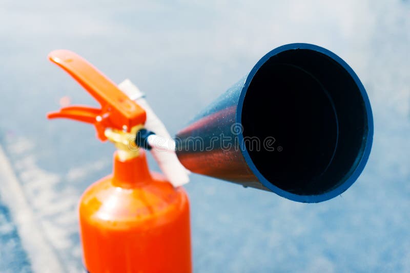 Fire Extinguisher on a Special Motorcycle To Extinguish the Fire. Closeup Stock Image Image