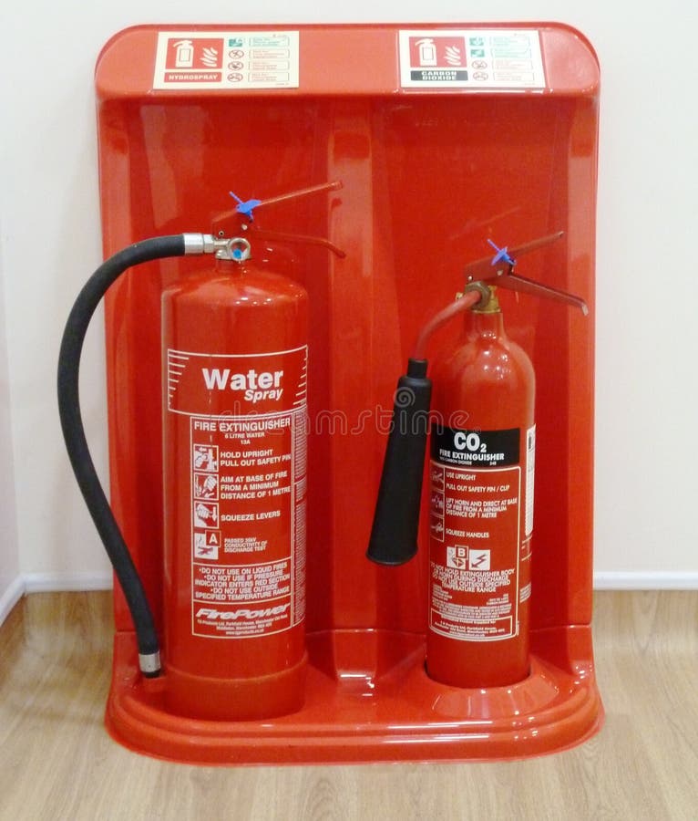 Fire extinguishers water and CO2 stock photography