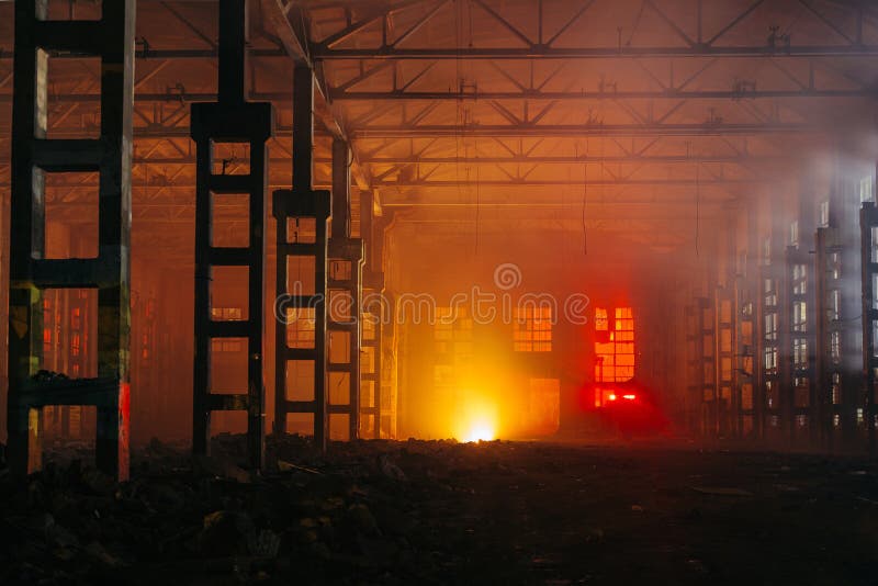 Fire in the factory. Burning industrial building interior stock photo Fire in the factory. Burning industrial building interior stock photo