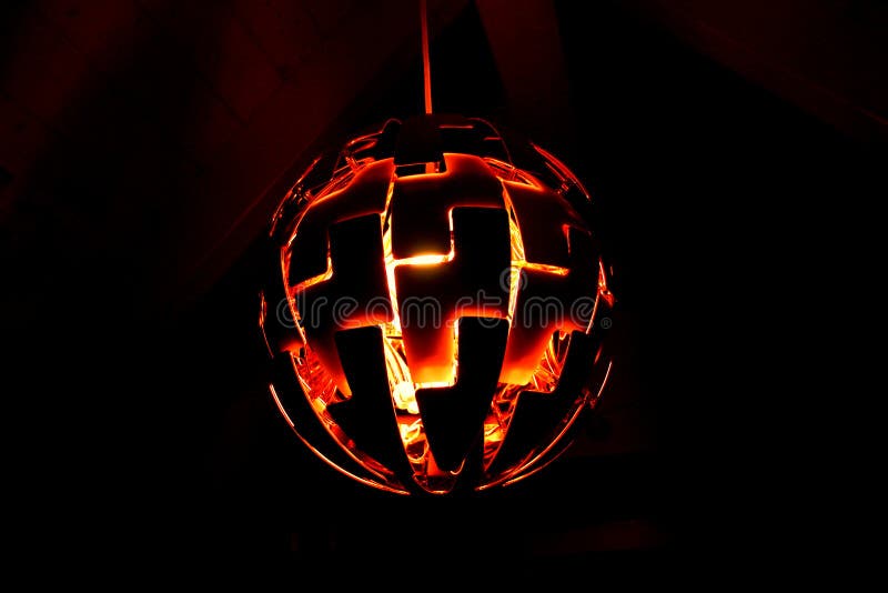 Fire flame inside metal ball. royalty free stock photography