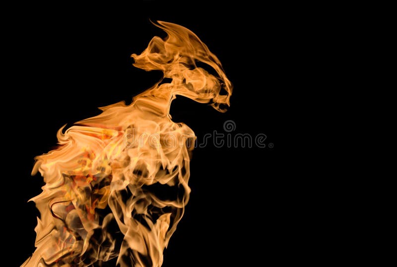 Fire a flame on a UFO-shaped alien on a black isolated background. fire patterns royalty free stock photos