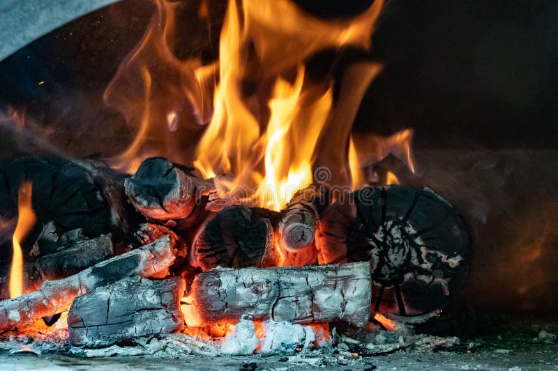 Fire Flames in a Oven stock photo. Image of barbecue 230564560