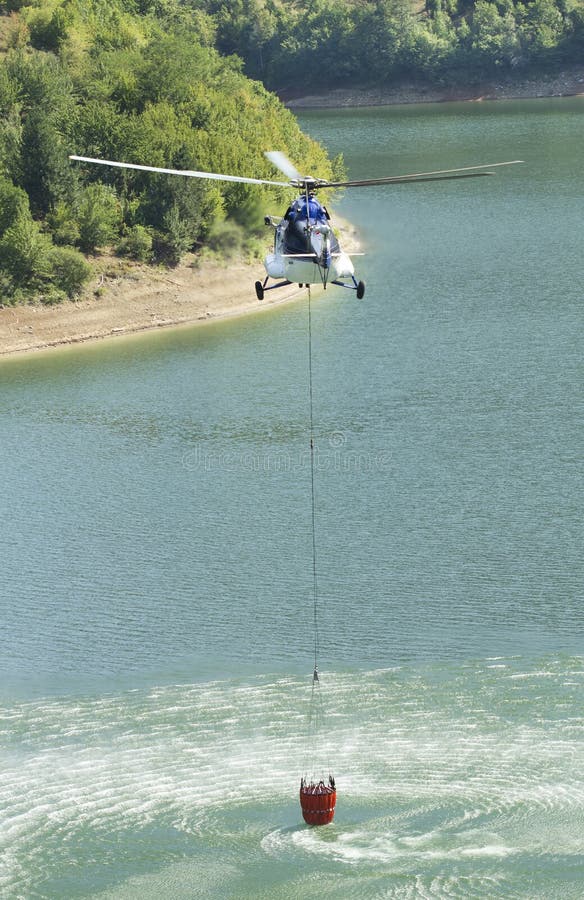 Fire Helicopter Filling with Water Stock Photo Image of rescue, fire 32831296