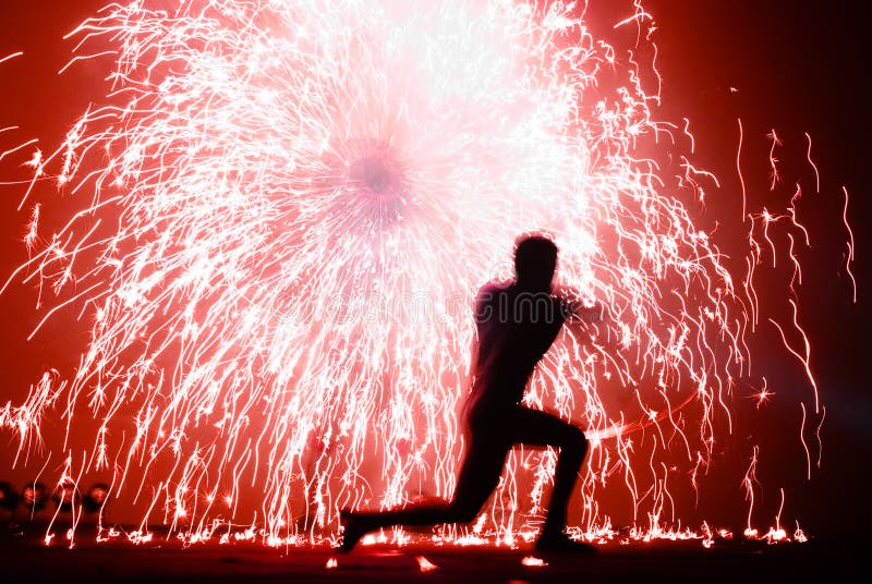 Fire juggler and sparks royalty free stock photo Fire juggler and sparks royalty free stock photo