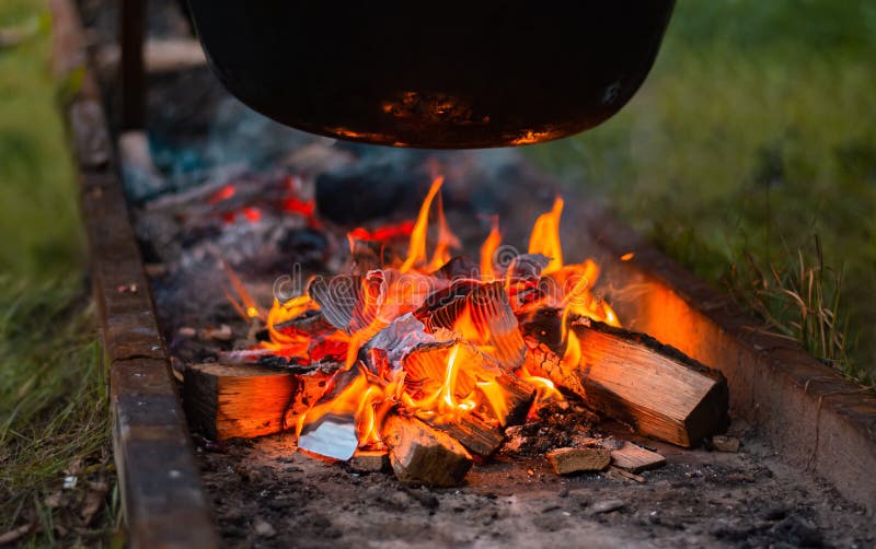 Fire Pit with Cauldron Cooking on the Beach Stock Image Image of