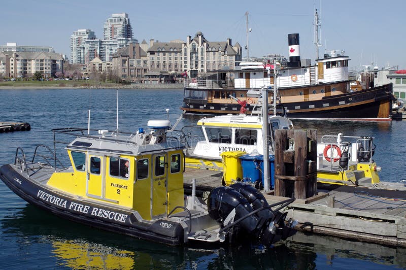 Fire rescue boats at the harbor stock images