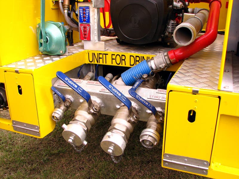 Fireman On Ladder Truck Spray Water On Fire Stock Image Image of work, action 15696733