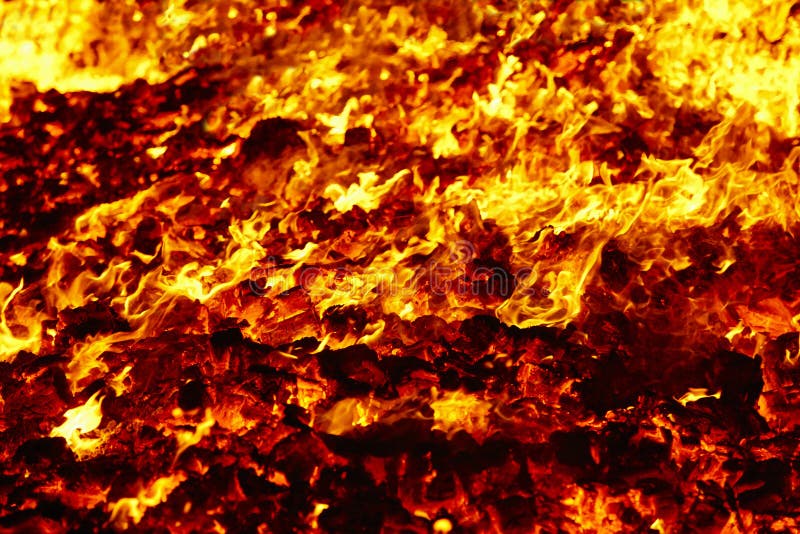 Fire. Volcano incandescent material. Hot charcoal bonfire. Carbon emissions