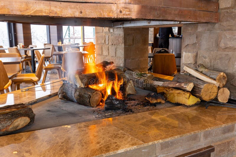 Fire, Wood Logs, Burning in the Fireplace in Mountain Restaurant Stock Image Image of mountain