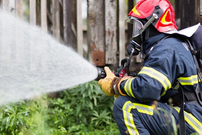 Firefighter extinguishes fire