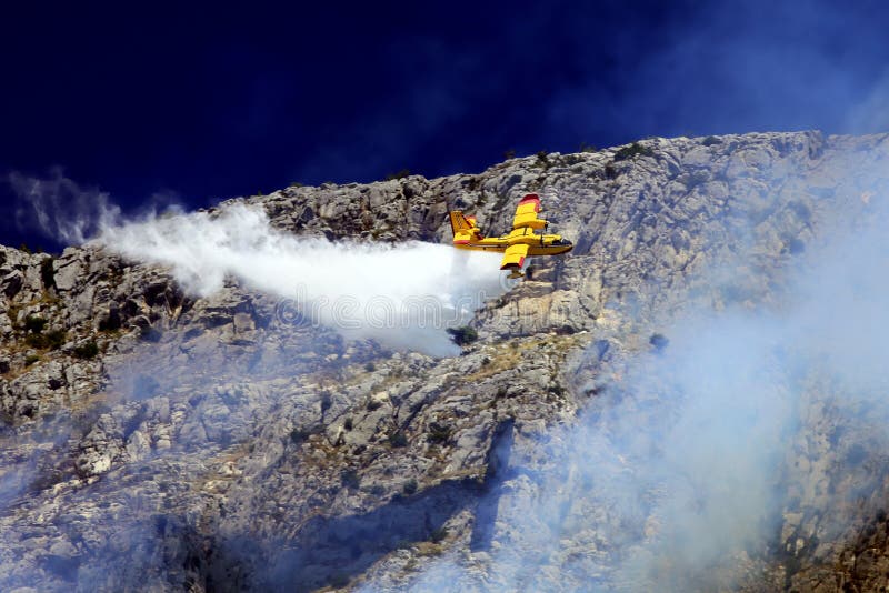 Firefighter plane in action royalty free stock photography