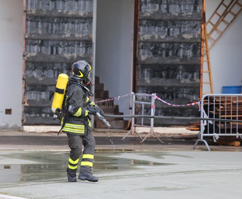 Firefighters with Breathing Apparatus and Oxygen Cylinder Runs Stock ...