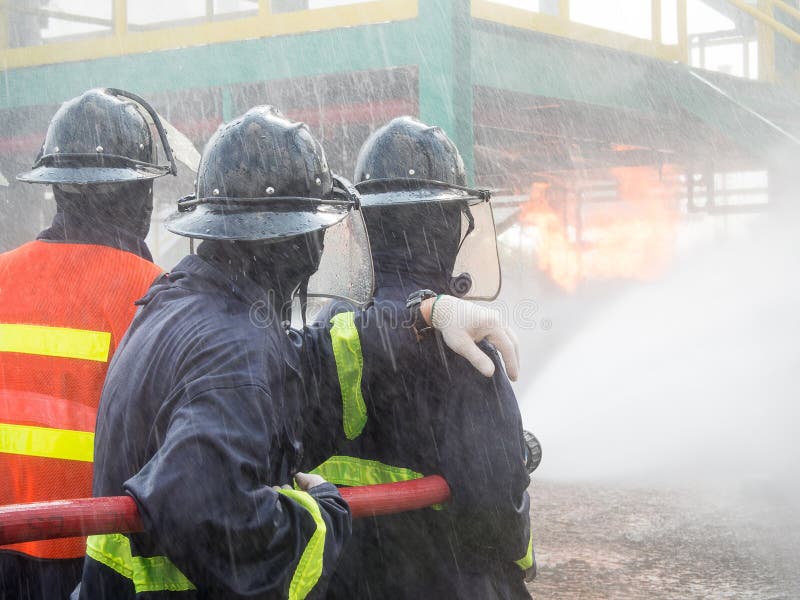 Firefighter Fighting For A Fire Attack, During A Training Exercise