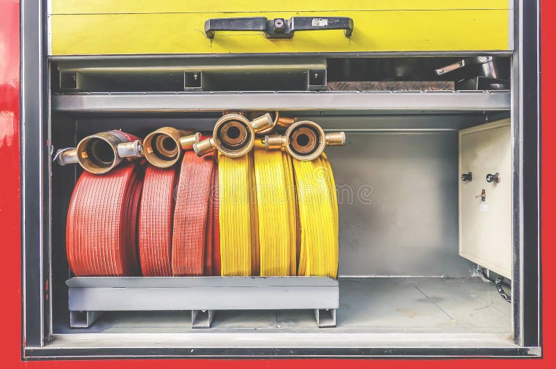 Firefighters tools fire extinguisher and hose, accessories and equipment for fire fighting royalty free stock image Firefighters tools fire extinguisher and hose, accessories and equipment for fire fighting royalty free stock image