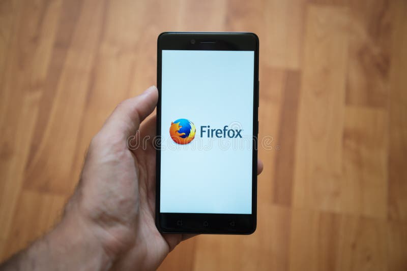 Firefox logo på smartphoneskärmen arkivfoton Firefox logo på smartphoneskärmen arkivfoton