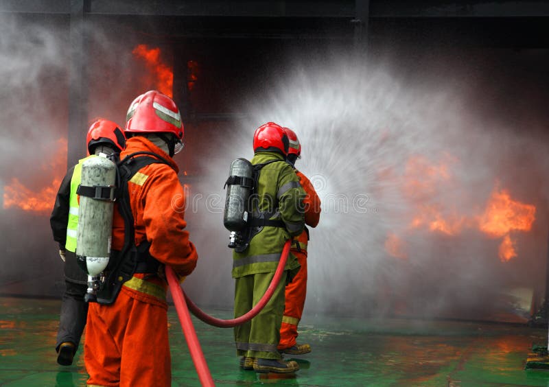 Fire fighting stock photo. Image of flaming, fireman 20489494
