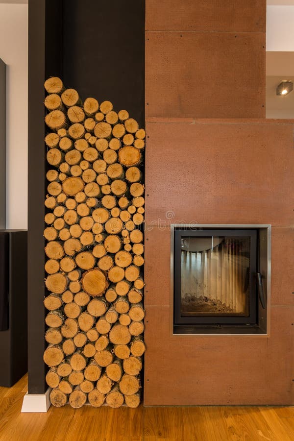 Fireplace and wood pieces stock image. Image of flat 52196237