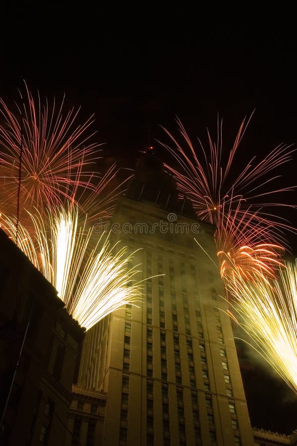 Fireworks around a tall building