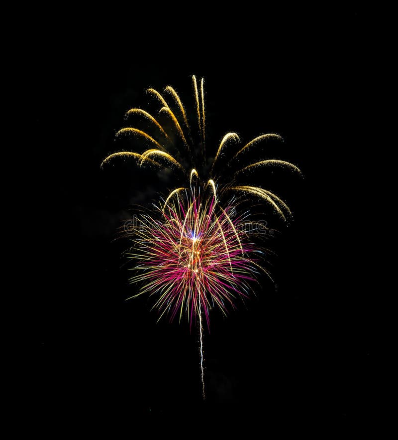 Fireworks Exploding Over the Mountains at night in Colorado royalty free stock photos