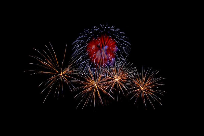 Fireworks light up in the night sky, dazzling scene stock image