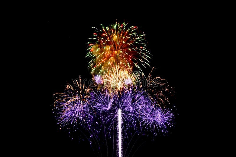Fireworks light up in the night sky, dazzling scene stock photo