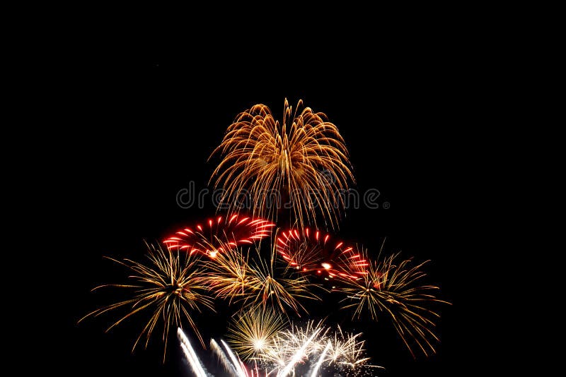 Fireworks light up in the night sky, dazzling scene stock images