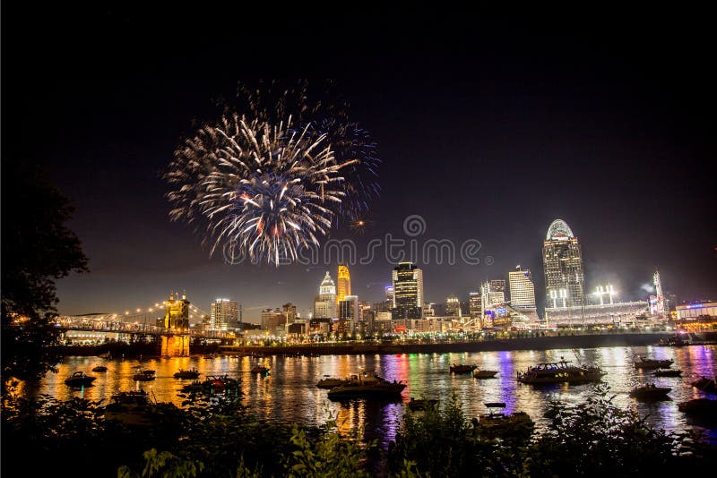 Fireworks exploding over the Ohio River at a Fourth of July festival in Cincinnati, Ohio. Fireworks exploding over the Ohio River at a Fourth of July festival in Cincinnati, Ohio.