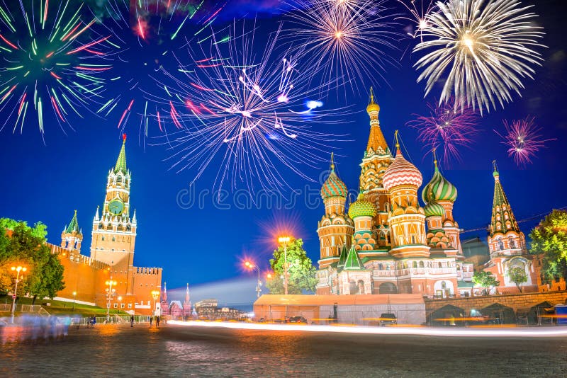 Fireworks over St Basil`s cathedral and Kremlin on Red Square at night, Moscow Russia
