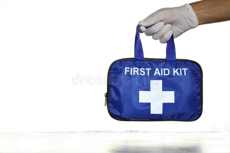 Hand holding a first aid kit bag.