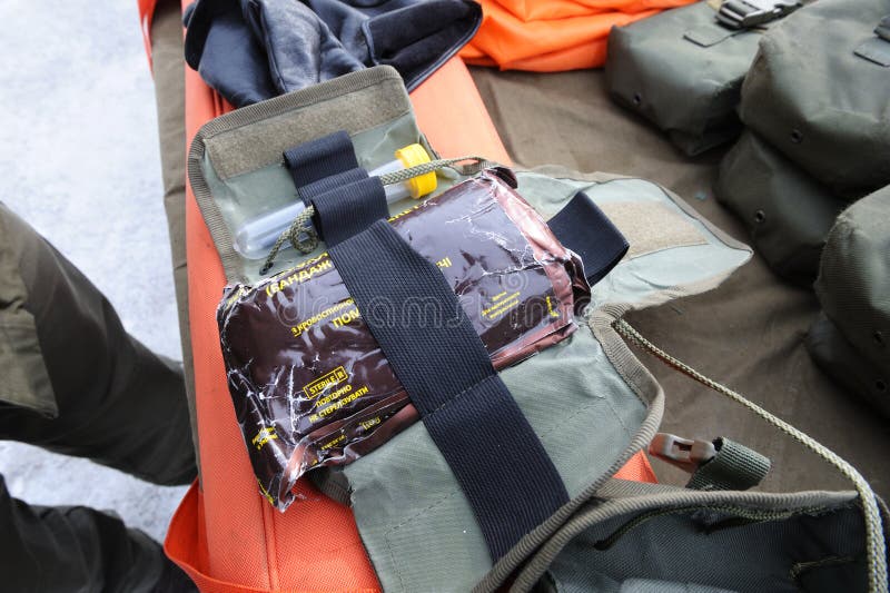 Firstaid Kit for Soldiers Placed on a Table, Military Training Stock