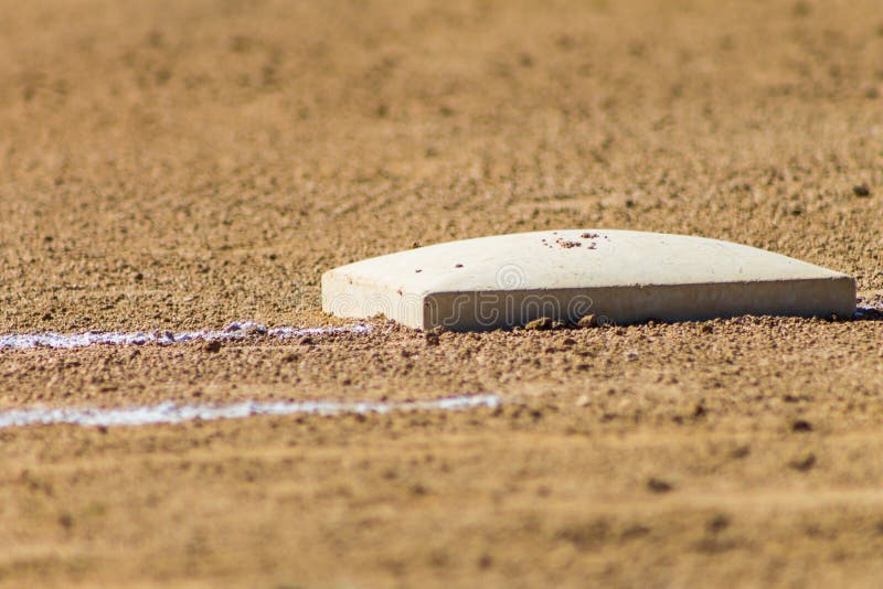 First base on a dirt softball or baseball field. First base on a dirt softball or baseball field