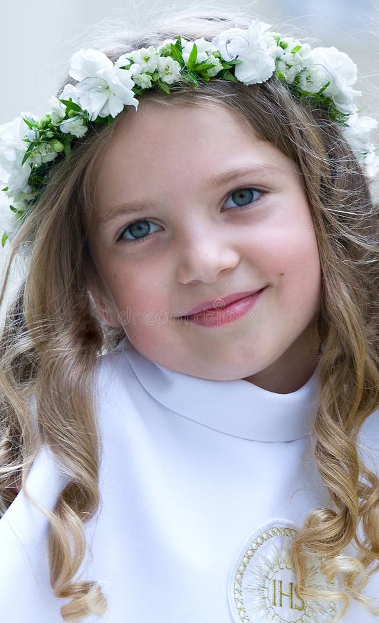 First Communion smiling girl stock photos First Communion smiling girl stock photos
