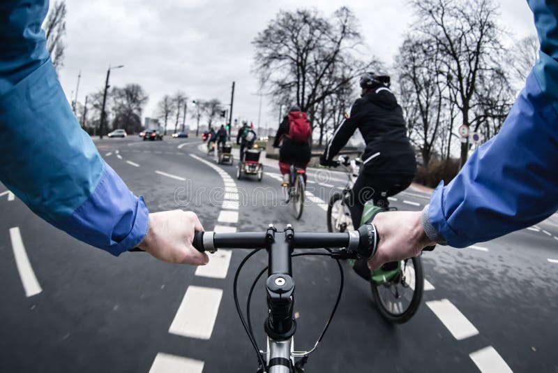 First-person view of cyclist in the city royalty free stock photo