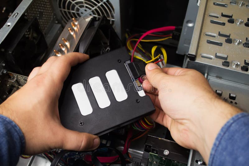 Connecting Computer Cables To The Hard Drive And Motherboard Stock