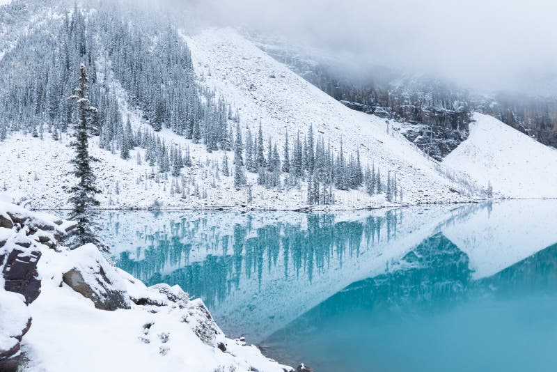 First Snow Morning At Moraine Lake In Banff National Park Alberta Canada Snowcovered Winter