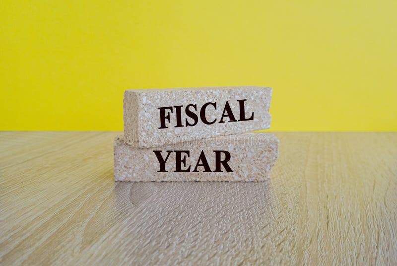 Fiscal Year Symbol Concept Words Fiscal Year on Brick Blocks on a Fiscal Year Symbol Concept Words Fiscal Year on Brick Blocks on a