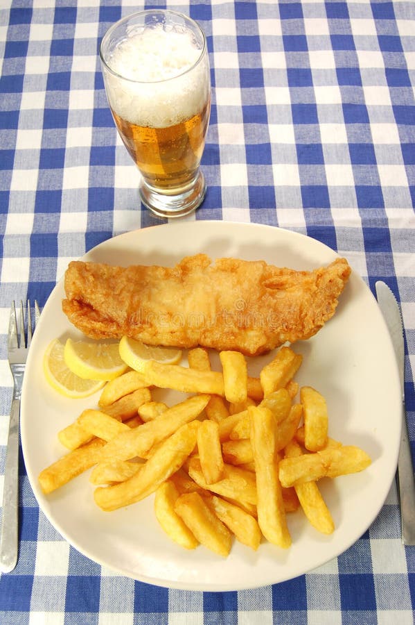 Plate of fish and chips and a glass of beer. Crispy diet stock images, royalty-free photos and pictures