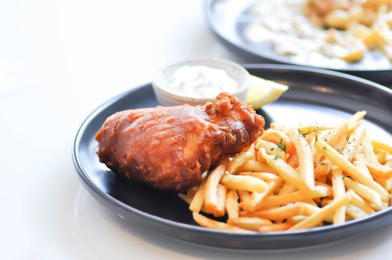 Fish and Chips or Fried Fish and French Fries Stock Photo - Image of