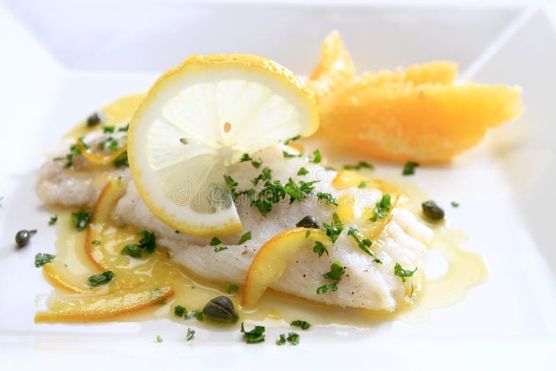 Fish with citrus sauce stock image. Image of gourmet 22927239