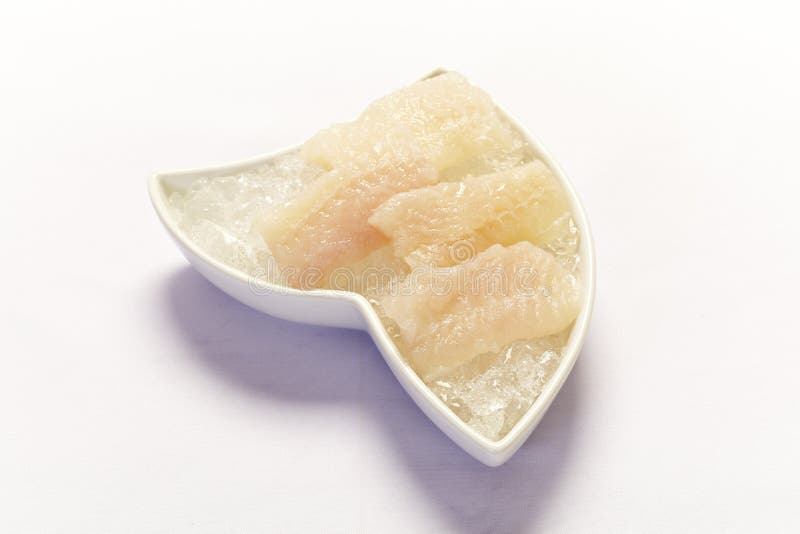 Fish fillet over white stock photography