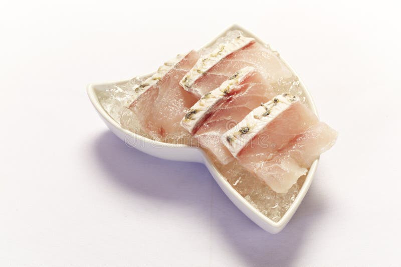 Fish fillet over white royalty free stock photography