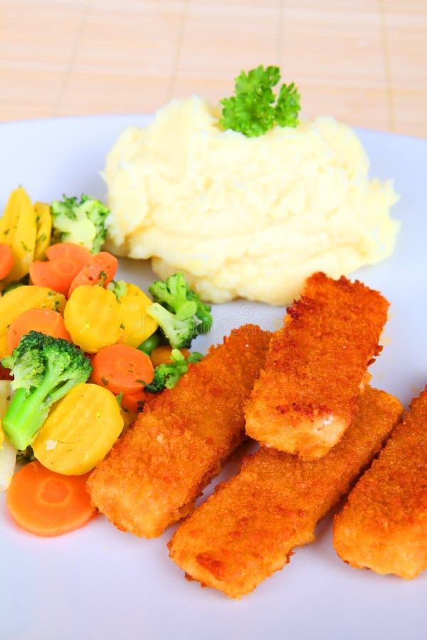 Fish fingers stock photo. Image of kids, fish, meal, carrots 74133538