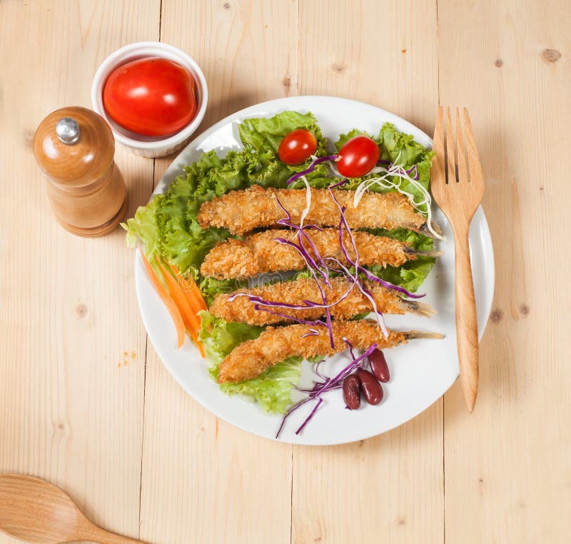 Fish fry in plate on wood stock photo. Image of fried 69074218