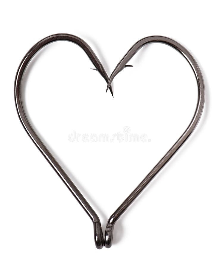 Fish hooks in heart shape stock photo. Image of together 43073740